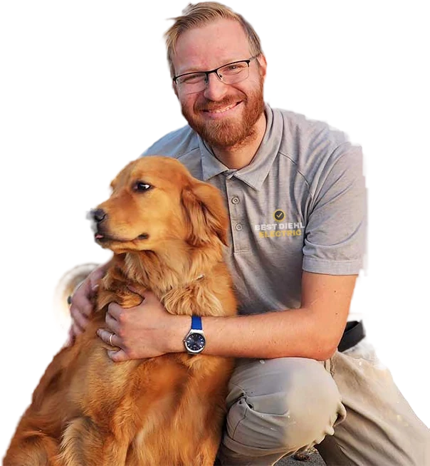 Craig Diehl, owner of Best Diehl Electric, with his dog